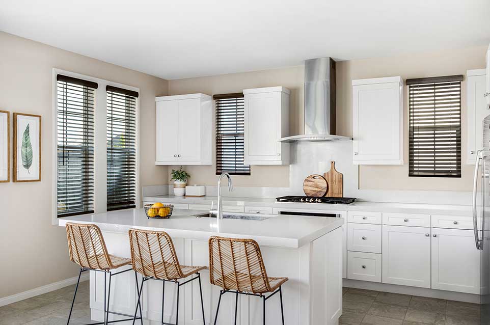 Faux Wood Blinds in a white kitchen