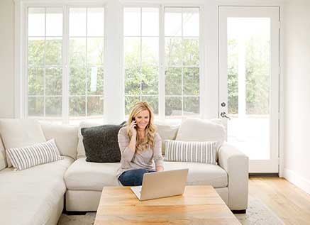 Woman on computer calling for an appointment