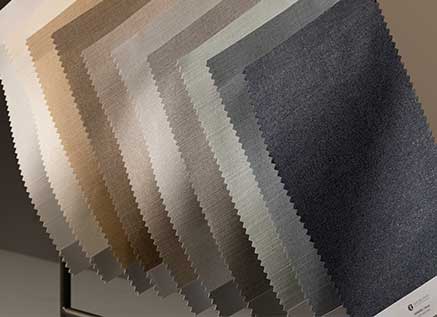 Roller Shade Swatches Hanging on a line with dramatic lighting